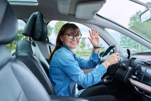 traffic ticket lawyer helping a happy driver get his license back